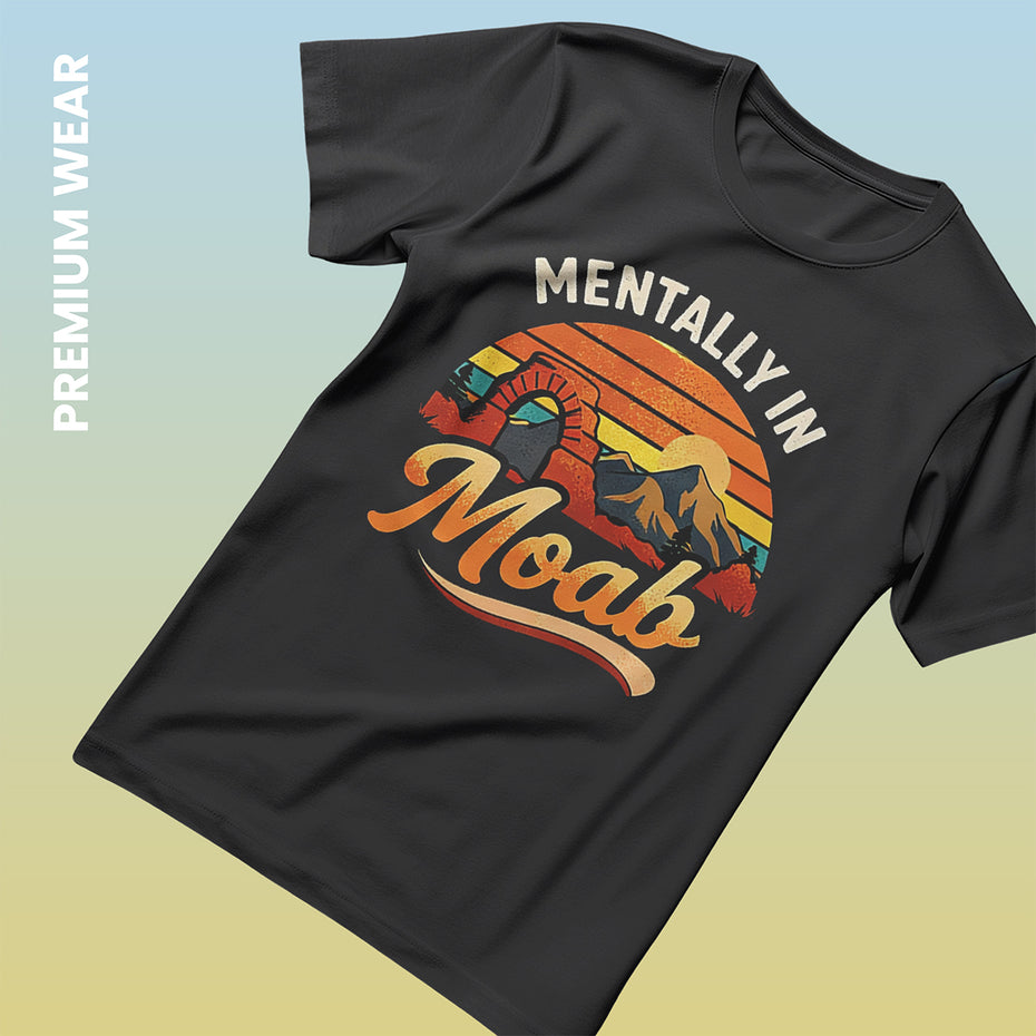 Black t-shirt with 'Mentally in Moab' graphic design on a gradient background